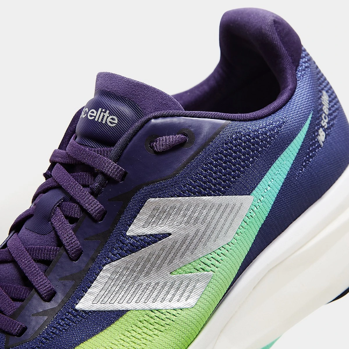 Tênis New Balance Fuelcell Supercomp Elite V5 Masculino Roxo+Verde - 38