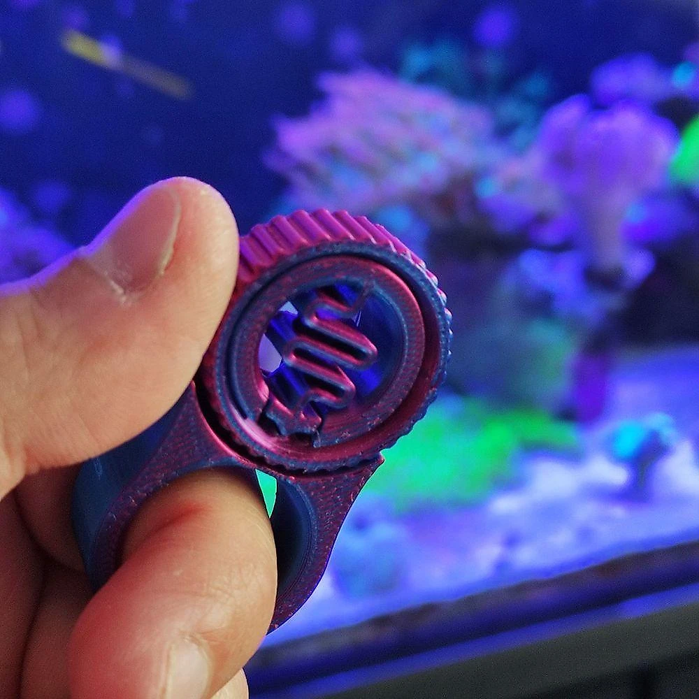 Brinquedo Antiestresse Anel Clique com Função de Clique e Movimento Giratório Fidget Toys 5,5CM